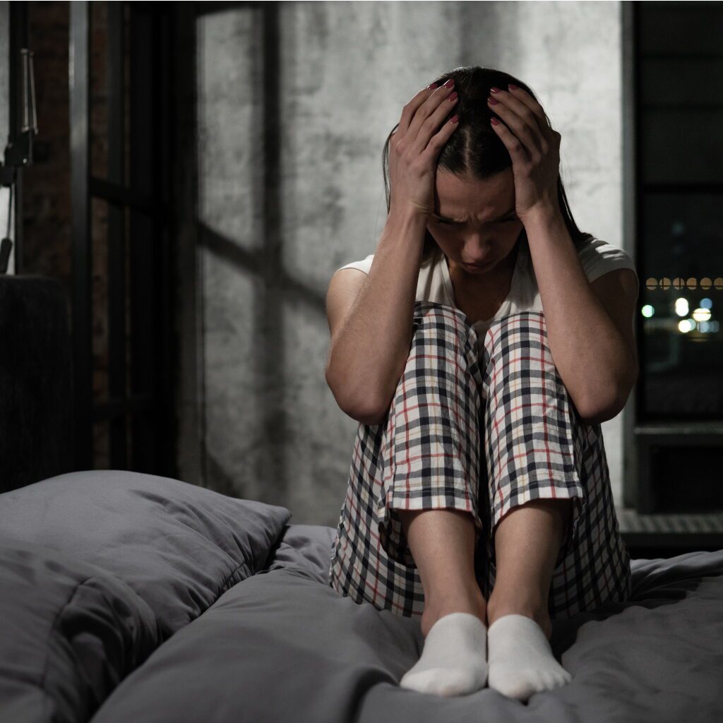 Peggy Green Thee Greif Specialist - Woman upset on a her bed