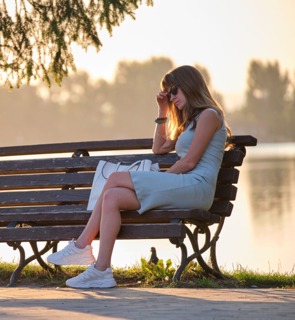 Peggy Green Thee Greif Specialist - Woman upset on a park bench